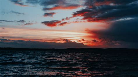 Download Wallpaper 3840x2160 Sea Surf Sunset Horizon Waves Clouds