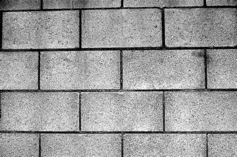 Wall of gray cinder block with seams. Cinder Block Wall Photograph by Jera Sky