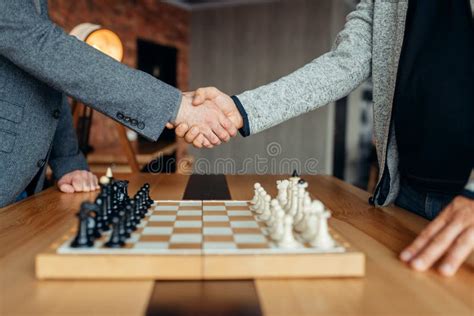 Male Chess Players Shake Hands Before The Game Stock Image Image Of