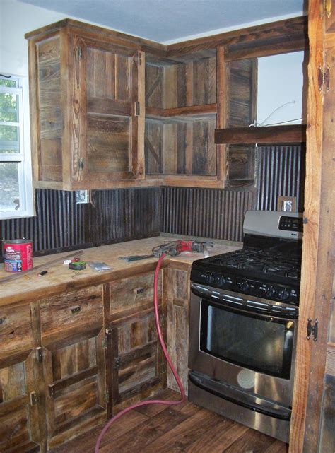 We Built These Barn Wood Cabinets And Used Old Tin For A Back Splash