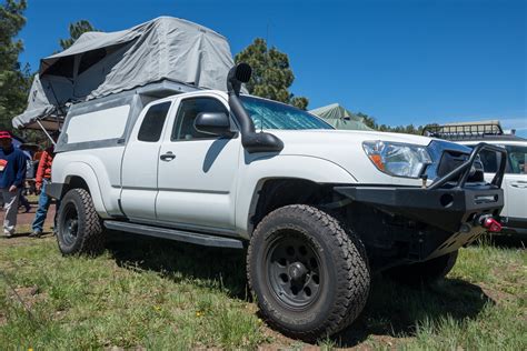 I saw this topper/camper setup at the auto show, they use an electric lift system and convert your and when i wanted to use the truck for anything else i had to remove the heavy platform & cabinet and i found a comfy folding cot that fits right and cut the legs to get the height right. Truck Topper Fit Chart 2006 Honda Ridgeline Camper Shell ...