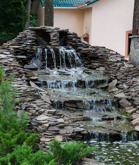A Large Multi Level Waterfall Water Feature Made Of Loosely Layered