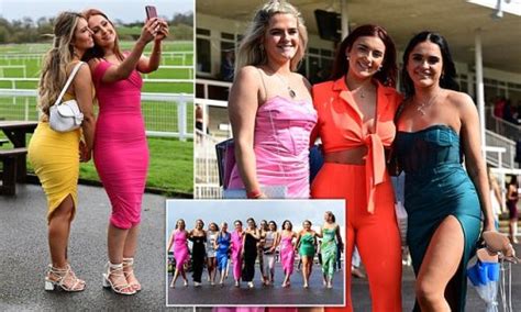 Here Come The Girls Glamorous Racegoers Defy The Windy Weather In