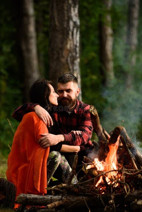 Couple In Love At Picnic With Fire In Forest Stock Image Image Of