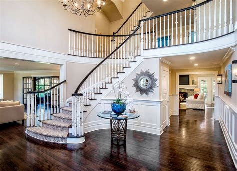 Grand Entryway With Staircase Front Entry Ideas 18