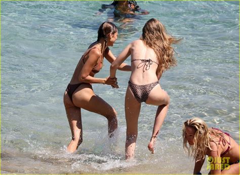Bella Gigi Hadid Wrestle At The Beach In Their Bikinis Photo