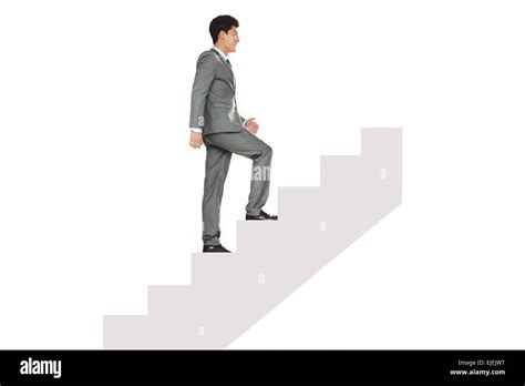 A Business Man To Walk Up The Stairs Stock Photo Alamy