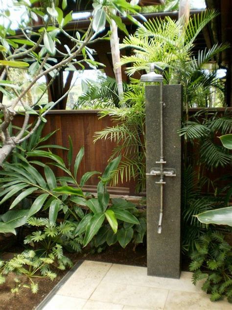 A tropical outdoor shower in hawaii features a stunning fixture made by boffi. tropical outdoor showers - Google Search | Fincas, Ave