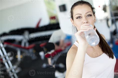 Girl Drinking Water In The Gym 4469508 Stock Photo At Vecteezy