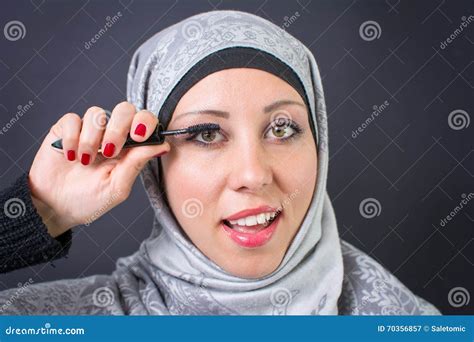 Muslim Woman Applying Mascara Stock Image Image Of Beautiful Arab