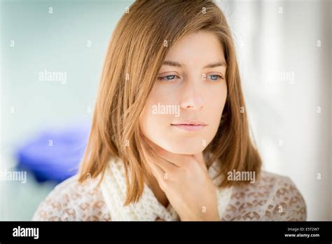 Woman Stroking Her Throat Stock Photo Alamy