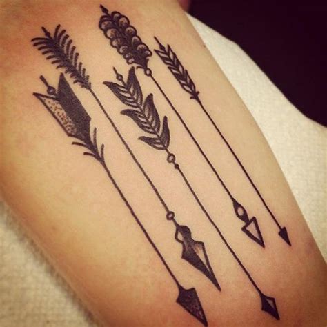 Arrow ﻿and﻿ feather tattoo meaning. Old school sugar skull tattoo meaning, small girly tattoos ...