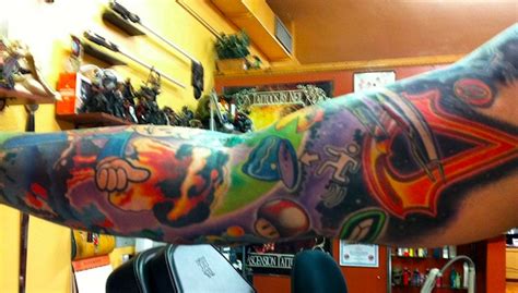 The Images And Stories Behind The Most Epic Game Tattoos On One Man