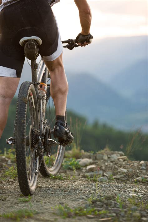 Closeup Of A Muscular Man Riding A Mountain Bike By Stocksy Contributor Ibex Media Stocksy