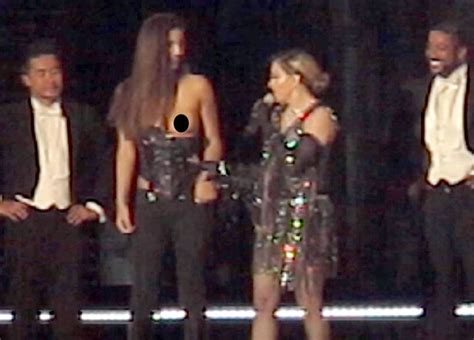 Madonna Shocks As She Pulls Down A Female Fan S TOP To Reveal Her Bare Breast On Stage Mirror