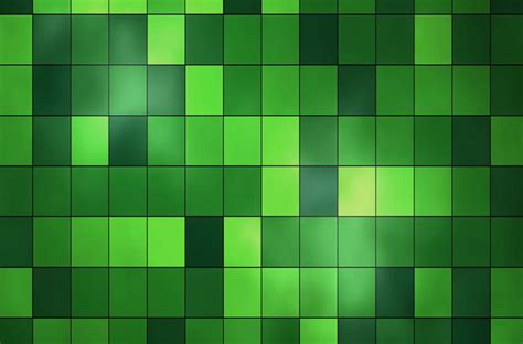 A Green Tiled Wall With Lots Of Small Squares