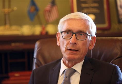 one day before wisconsin election gov tony evers delays in person voting local government