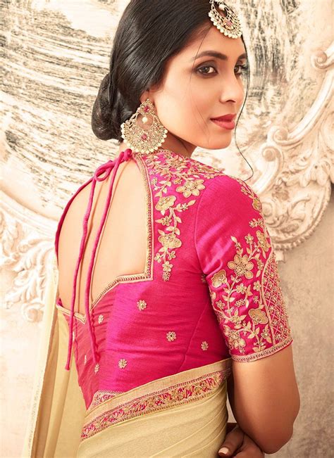 Cream And Pink Embroidered Silk Saree Features A Beautiful Silk Saree
