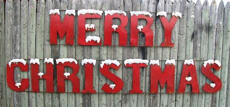With pine cones and festive ornaments on dark recycled wood with copy space for your text here. Lg 120" Long Tin Merry Christmas Sign Holiday Decorating ...