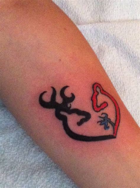 Black And Red Browning Deer Tattoo On Arm
