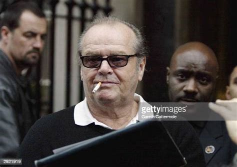 Actor Jack Nicholson Smokes A Cigarette As He Leaves Claridges Hotel