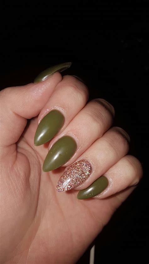 Once more, your nails will go under a nail lamp to cure. army green matte gel nails | Nagels, Nailart