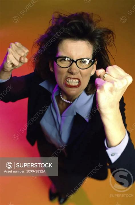 Portrait Of A Businesswoman Making A Fist Superstock