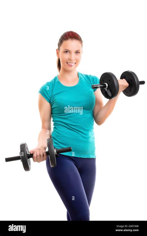 Fit Attractive Young Smiling Woman In Sportswear Doing Dumbbell