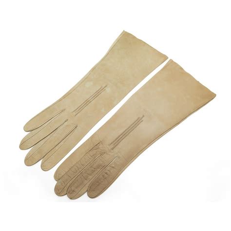 Maybe you would like to learn more about one of these? paire de gants longs hermes en cuir beige femme taille