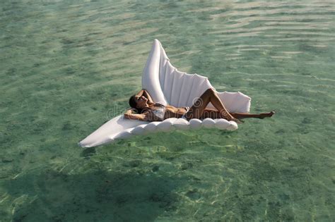 Woman In Elegant Beach Clothes Relaxing On Maldives Island Stock Image