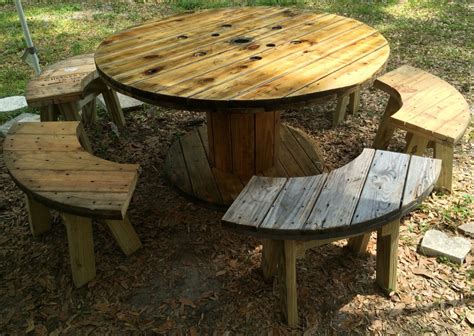 Originally, he painted the top. Wire Spool Table with Benches