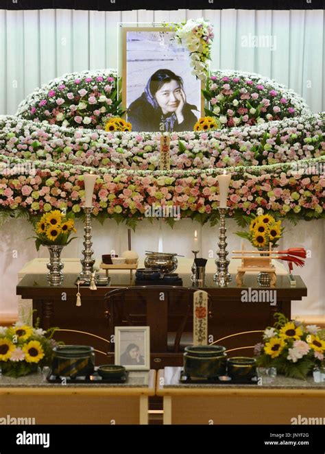 tsuru japan photo shows the altar for and a portrait of mika yamamoto a japanese journalist
