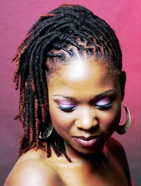 Here, fake pink hair has been braided into the roots of the real hair and rolled into faux locs. 2 hairstyles for short dreads