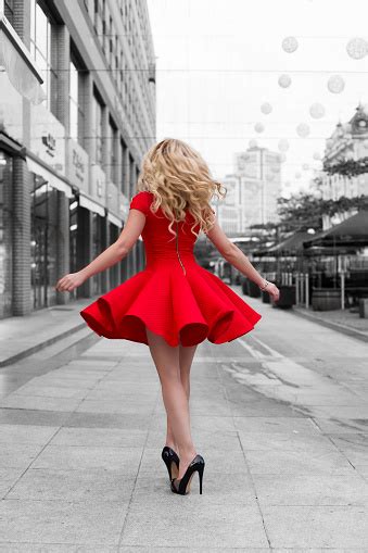 Woman In Red Dress Walking At Bw Outdoor Stock Photo Download Image