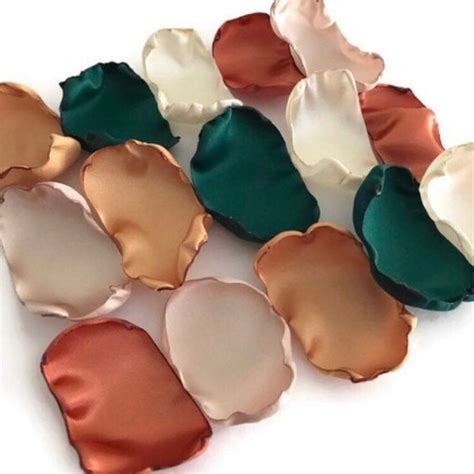 Several Different Colored Seashells Sitting On Top Of Each Other