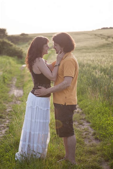 Couple Standing In A Field Stock Photo Image Of Life 74336100