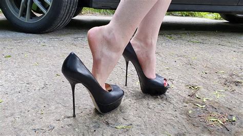 angelina takes off high heels pumps and put it back on her feet shoeplay shoe dipping scene