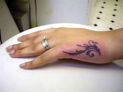 side of hand tattoo