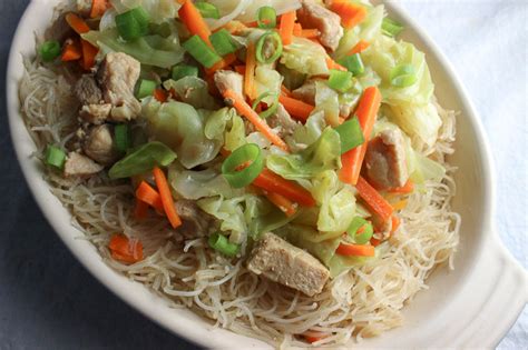 Filipino Pancit Bihon Stir Fried Rice Noodles With Pork And Vegetables