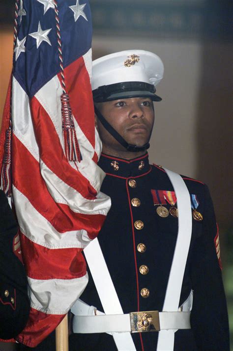 A Us Marine Corps Usmc Color Guard Sergeant Sgt Holds The American