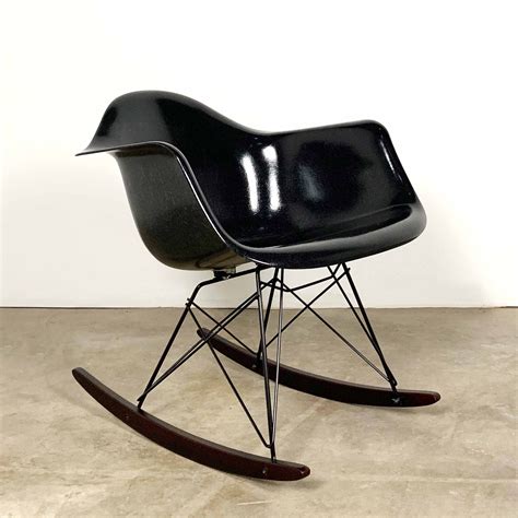 The eames rocking chair, often called the rar, replaces the classic chair structure with a stainless steel wire frame and maple rockers. RAR Fiberglass Rocking Chair by Charles & Ray Eames for ...