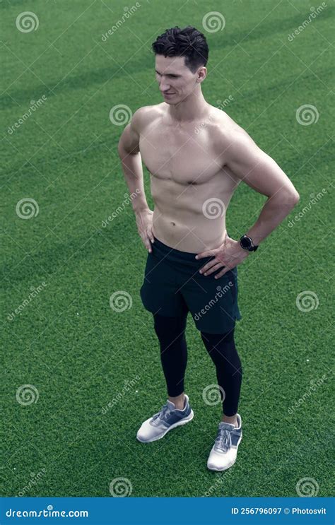 Confident Young Fitness Man With Strong Hands Strong Athletic Man