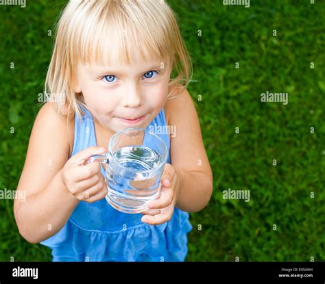 Smiling Little Girl Glass Water Hi Res Stock Photography And Images Alamy