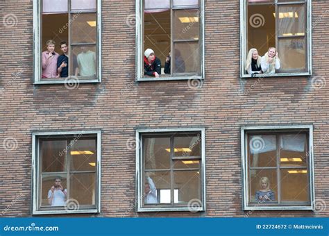 People Looking Out Multiple Windows Editorial Photography Image 22724672