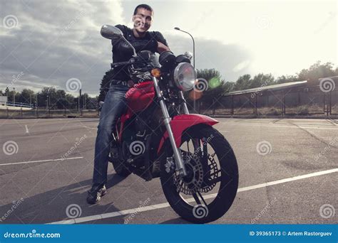 Biker Sitting On Sporty Motorcycle Stock Image Image Of Adventure