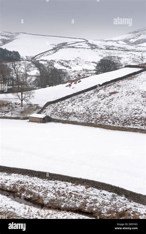Both The Farmland And Hillsides Are Blanketed In Snow During The Depths