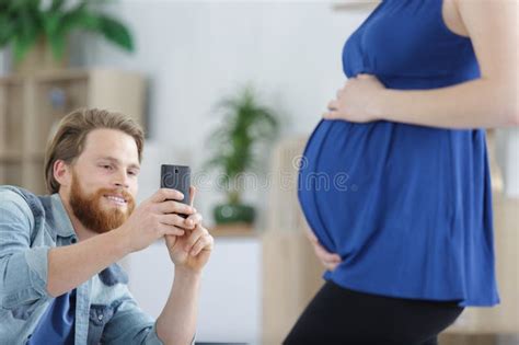 father taking photo pregnant wife stock image image of portrait attractive 270840215