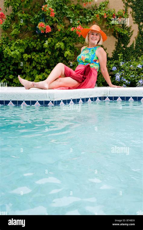 Woman Lounging Poolside Hi Res Stock Photography And Images Alamy