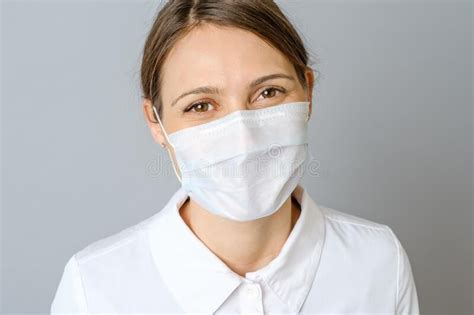 happy doctor wearing surgical mask isolated on gray happy doctor wearing surgic sponsored