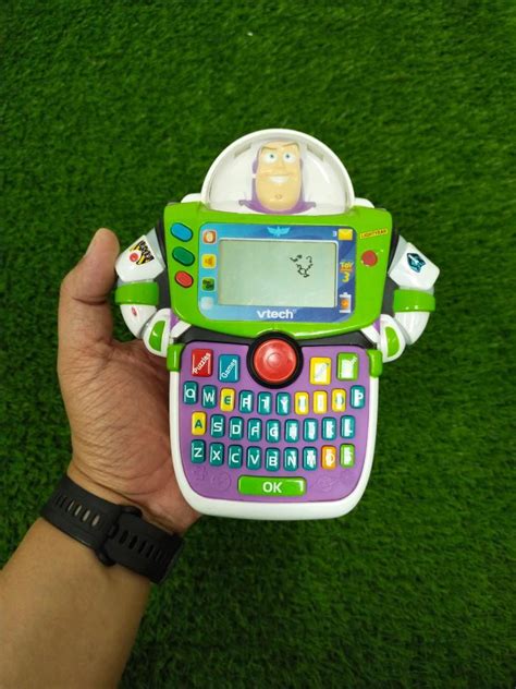 Vtech Toy Story Buzz Lightyear Learn And Go Handheld Games Hobbies